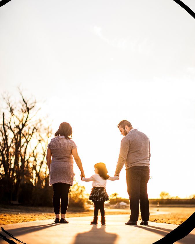 parents walking with child